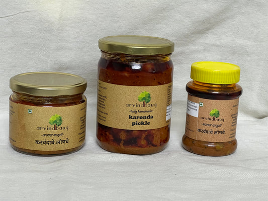 200 g, 250 g, and 500 g jars of Arvindbaug karonda pickle.