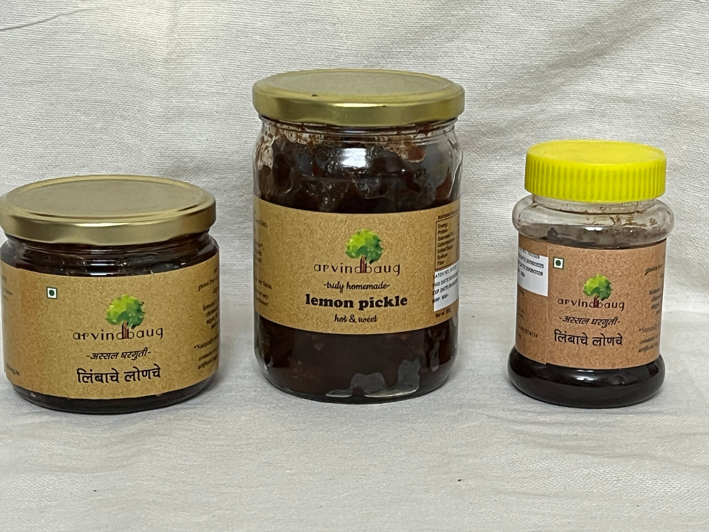 200 g, 250 g, and 500 g jars of Arvindbaug lemon pickle.