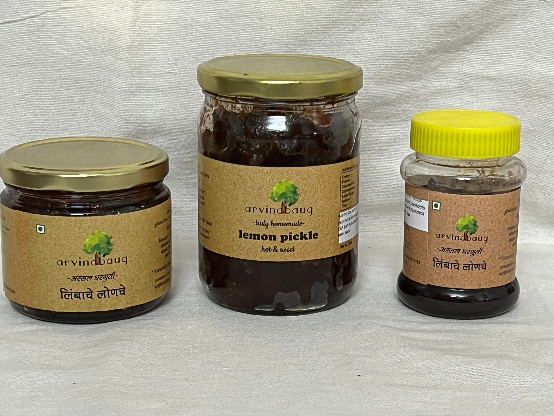 200 g, 250 g, and 500 g jars of Arvindbaug lemon pickle.
