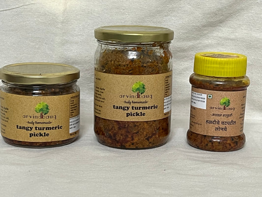 200 g, 250 g, and 500 g jars of Arvindbaug tangy turmeric pickle.